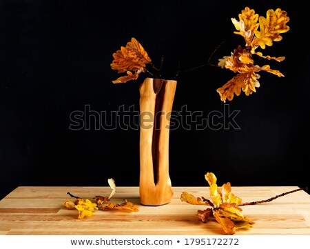 Stok fotoğraf: Autumn Leaves On A Wooden Table