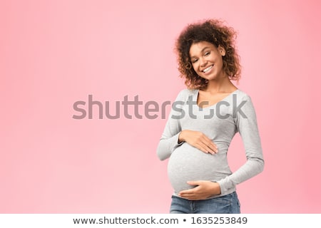 Stock fotó: Pregnant Woman Smiling At Camera