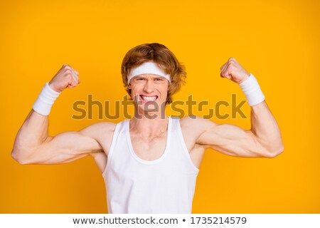 Stock photo: Ironic Muscular Man