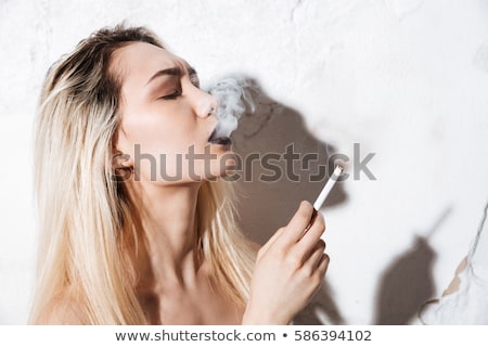Сток-фото: Side View Of Cool Hipster Girl Smoking The Cigarette