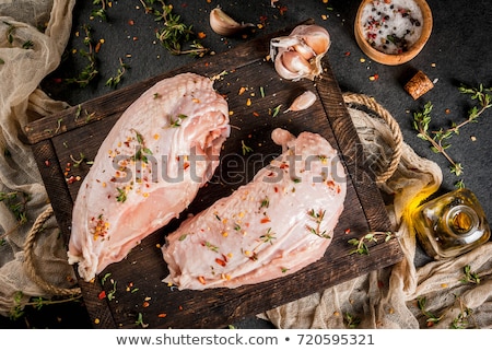 ストックフォト: Raw Chicken Breasts Fillets With Thyme And Spices On Wooden Cutting Board On Rustic Background Copy