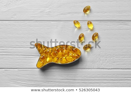 Сток-фото: Healthy Fish Oil In Yellow Capsules