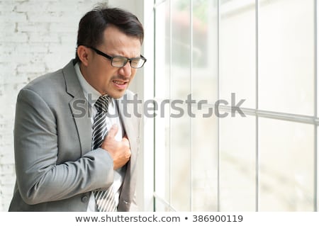 Stock photo: Gray Suit Businessman About The Sickness