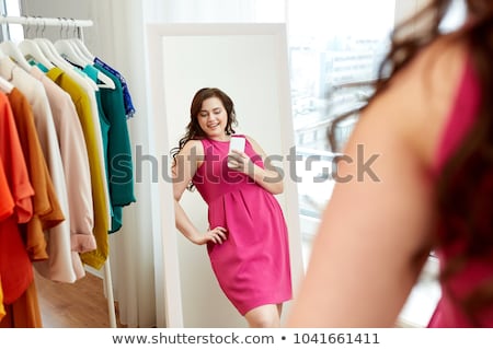 Stok fotoğraf: Plus Size Woman Taking At Mirror Selfie At Home
