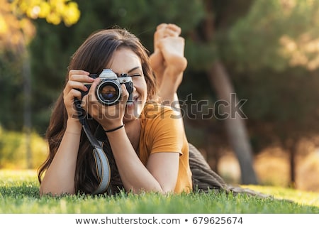 Stok fotoğraf: Beautiful Brunette Woman Outdoor With Digital Camera