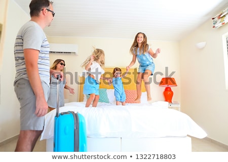 Zdjęcia stock: Family With Three Kids With Luggage In Hotel Room