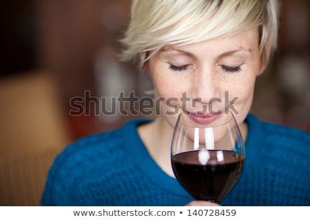 Stock fotó: Happy Woman Drinking Red Wine At Bar Or Restaurant