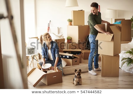 Stock foto: Man Moving House With Boxes