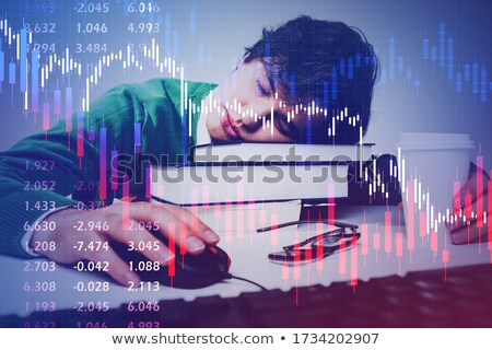 Stock photo: Businessman Sleeping With Charts Graphs And Reports Concept