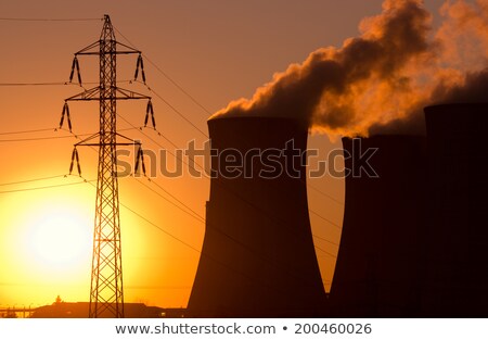 Silhouettes Of A Nuclear Power Plants At Sunset Zdjęcia stock © martin33