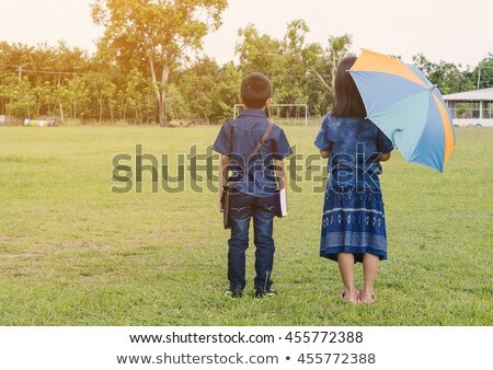 Zdjęcia stock: Young Attractive Caucasian Couple Hand In Hand Looking Back