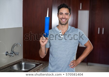 ストックフォト: Portrait Of Happy Man With Pest Control Injection