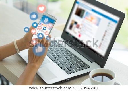 Stock photo: Young Person Using Phone With Social Media Concept