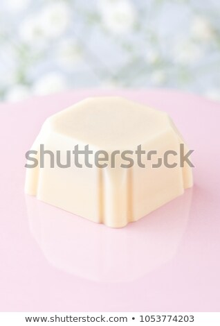 Luxury Square White Chocolate Candy On Pink Plate Foto stock © DenisMArt