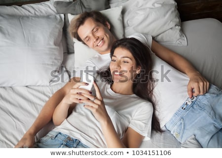 Foto stock: Networking In Bed