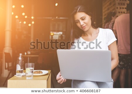 Foto stock: One Woman During The Lunch Break