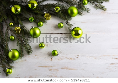 Green Christmas Ball On Branch [[stock_photo]] © TasiPas