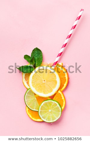 Stock photo: Fresh Orange Juice Glass With Sliced Fruits - Flat Lay