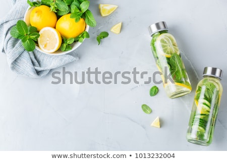 Foto d'archivio: Detox Fruit Infused Flavored Water Refreshing Summer Homemade Lemonade Cocktail