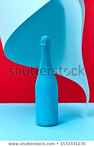 [[stock_photo]]: Mock Up Blue Painted Wine Bottle With Folded Paper
