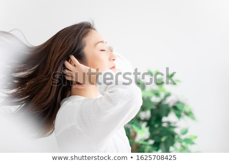 Stock photo: Attractive Brunette Woman With Blowing Hairs