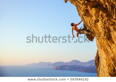 Zdjęcia stock: Guy Climbing On Rock