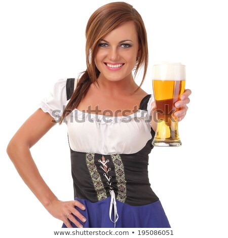 ストックフォト: Smiling Waitress Holding Glass Of Beer At Counter