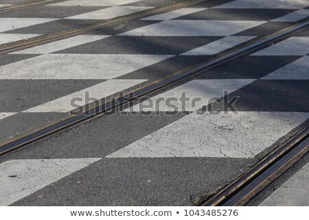 Stockfoto: Street Road View With Black And White Painted Grid Squares