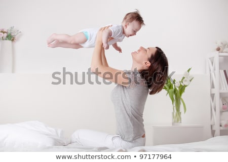 Stock fotó: Iimage Of Mother And Baby On Bed