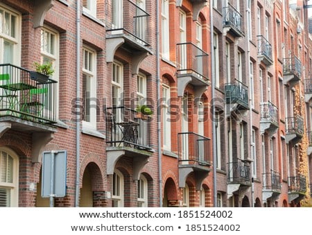 [[stock_photo]]: Typical Amsterdam Old City Street View With Traditional Building