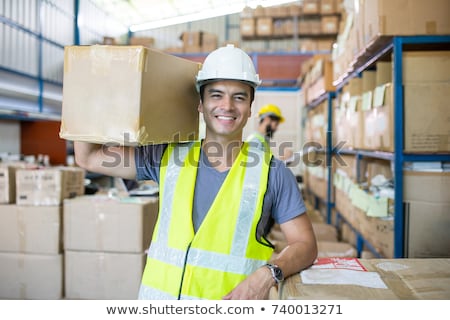 Foto d'archivio: Portrait Of Manual Worker In Warehouse