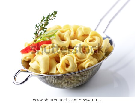 ストックフォト: Stuffed Pasta In A Sieve