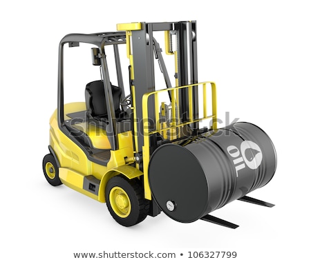 Foto d'archivio: Yellow Fork Lift Lifts Oil Barrel