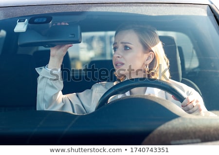 [[stock_photo]]: Woman Face Car Mirror