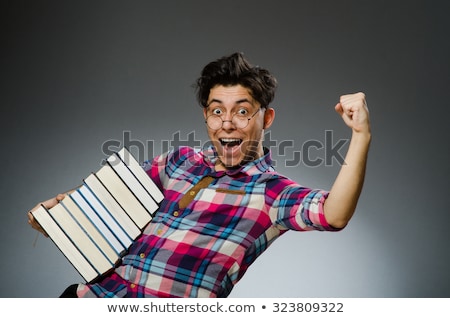 Funny Student With Stack Of Books Stock fotó © Elnur