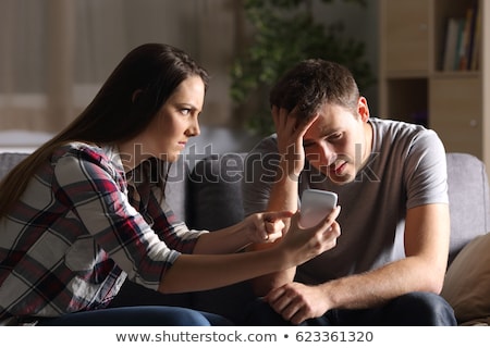 [[stock_photo]]: Woman Accusing Her Guilty Looking Boyfriend