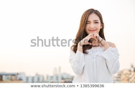Foto stock: Portrait Of A Happy Smiling Asian Girl