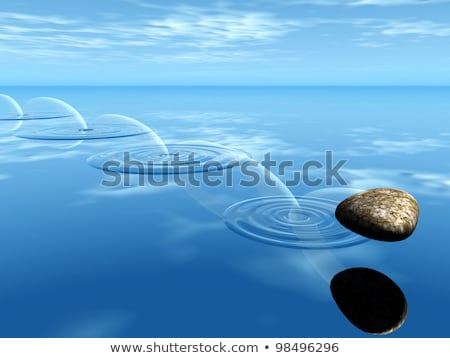 Сток-фото: Ricochets Of A Stone On Water