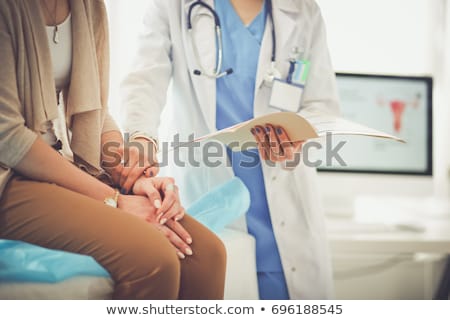 Stockfoto: Blond Woman In Doctors Appointment