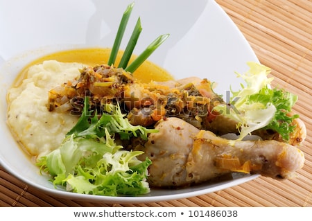 Stock photo: Roasted Chicken Legs With Mashed Potatoes Vegetables Saute And Greens