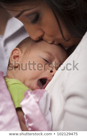Foto d'archivio: Attractive Ethnic Woman With Her Newborn Baby