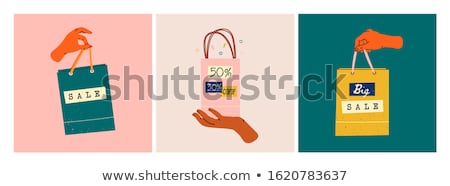 [[stock_photo]]: Womans Hand With Shopping Bags