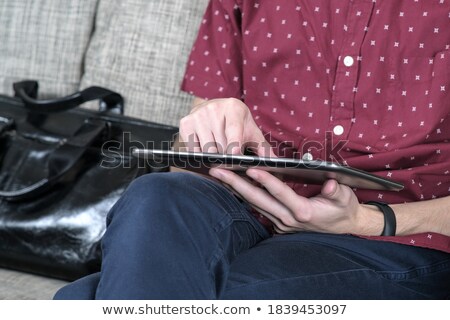 Foto d'archivio: Businessman Sat Down With Briefcase