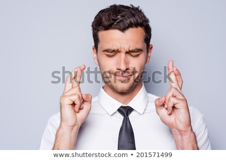 Stock fotó: Businessman With Fingers Crossed