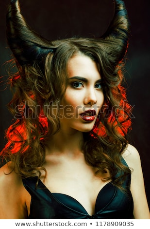 Foto stock: Bright Mysterious Woman With Horn Hair Halloween Celebration