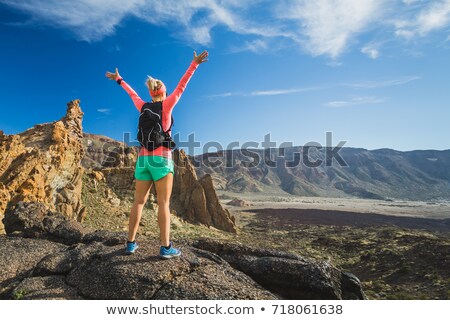 Foto d'archivio: Hiking Woman Celebrating Inspirational Mountains Landscape