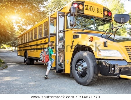 Foto stock: Children And School Bus At School