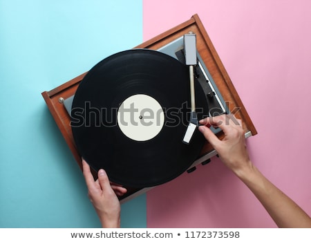 Foto stock: Female Dj Scratching The Vinyl Record