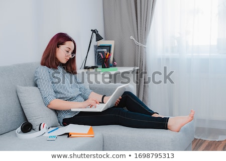 Stok fotoğraf: Young Handsome Student Studying At Home