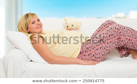 Сток-фото: Happy Pregnant Woman With Red Heart Shaped Cushion